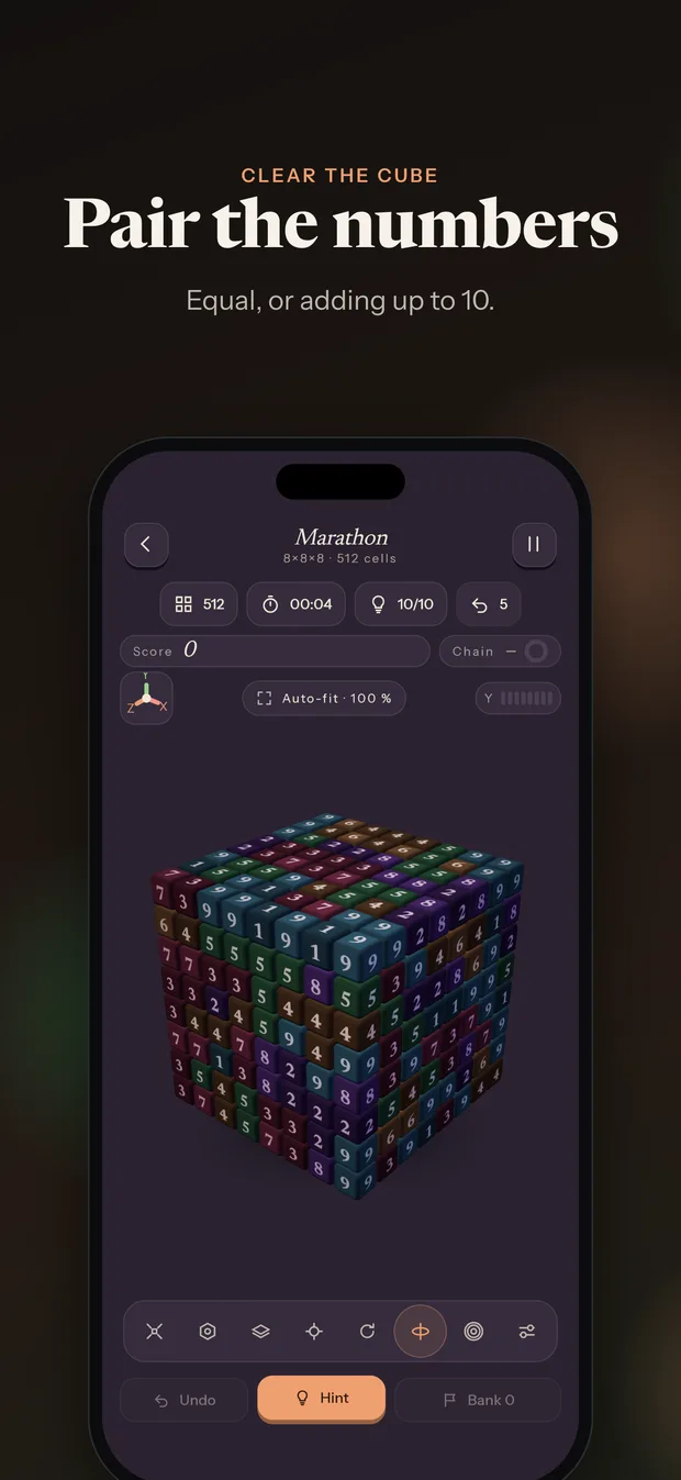A Numbers3D cube mid-game on a phone, with numbered cells on its outer faces.